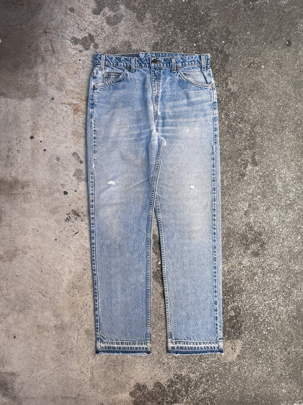 1990s Orange Tab Levi’s Repaired Faded Blue 505 Released Hem (33X32)