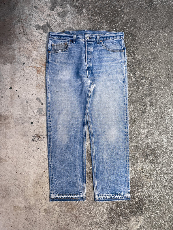 1990s Levi’s Repaired Faded Blue 501xx Released Hem (33X27)