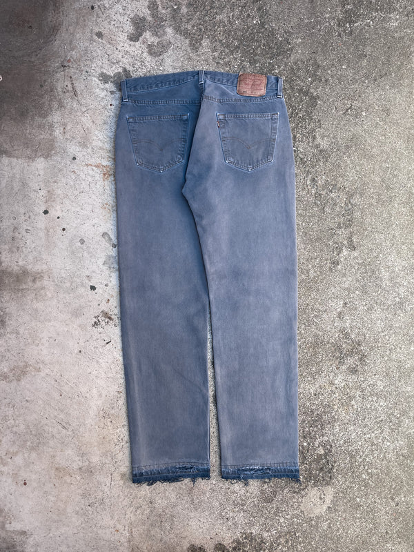 1990s Levi’s Sun Faded Blue 501 Released Hem (34X31)