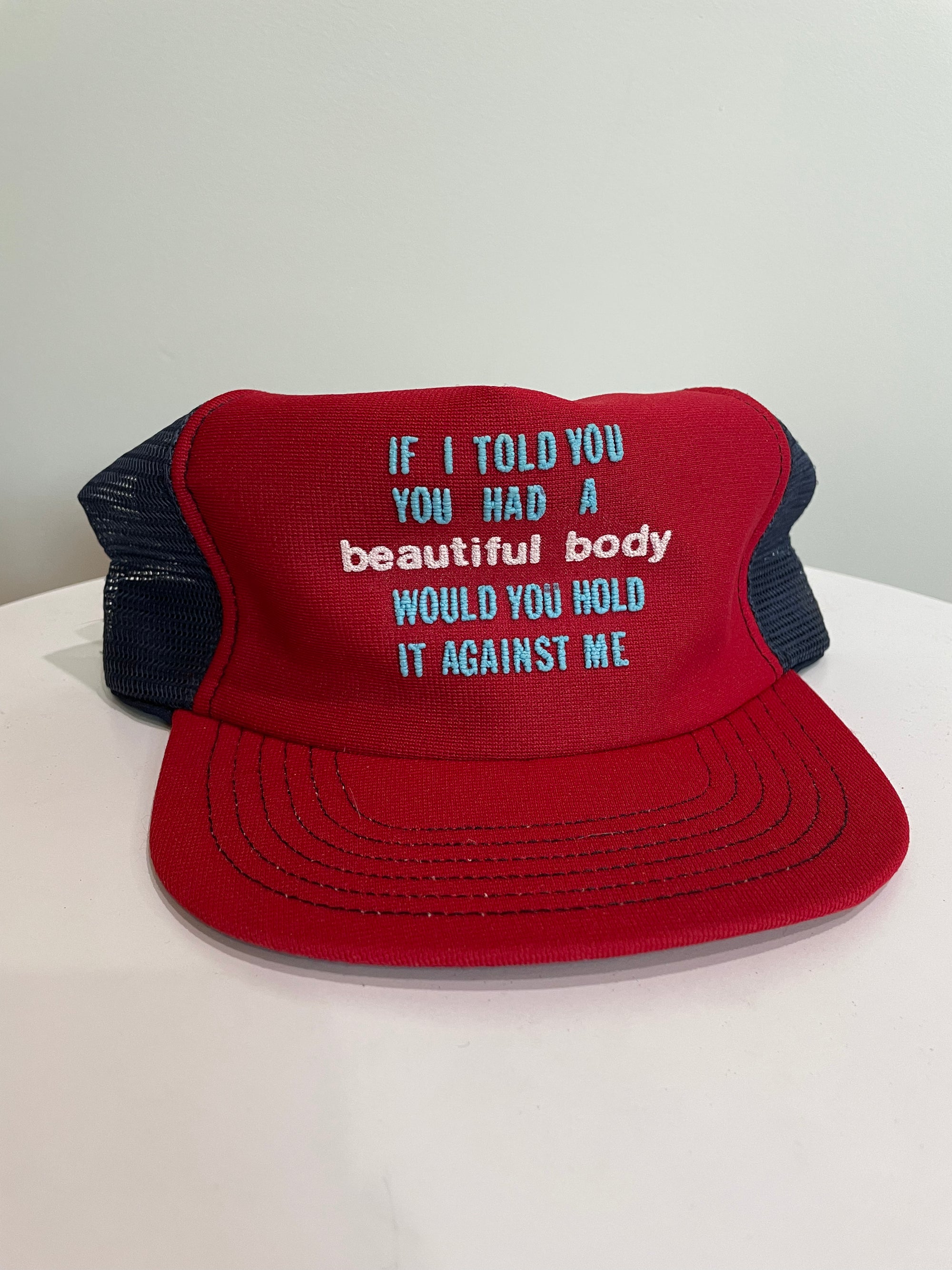 1980s “If I Told You You Had A Beautiful Body…” Trucker Hat