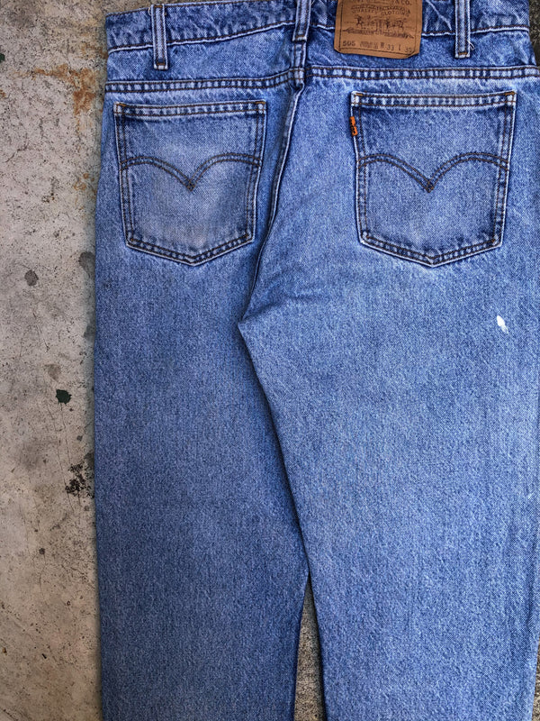 1990s Orange Tab Levis Faded Blue 505 Released Hem (31X28)