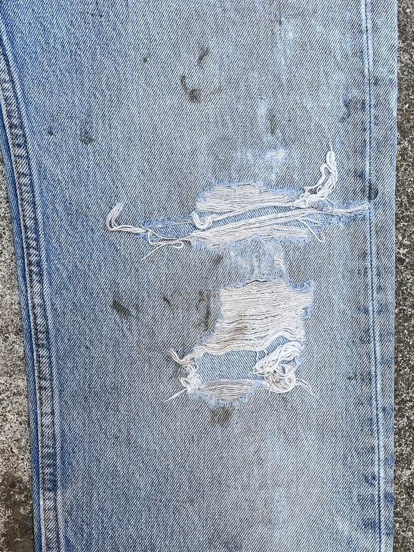 1990s Levi’s Distressed Faded Blue 501XX Raw Hem (30X27)