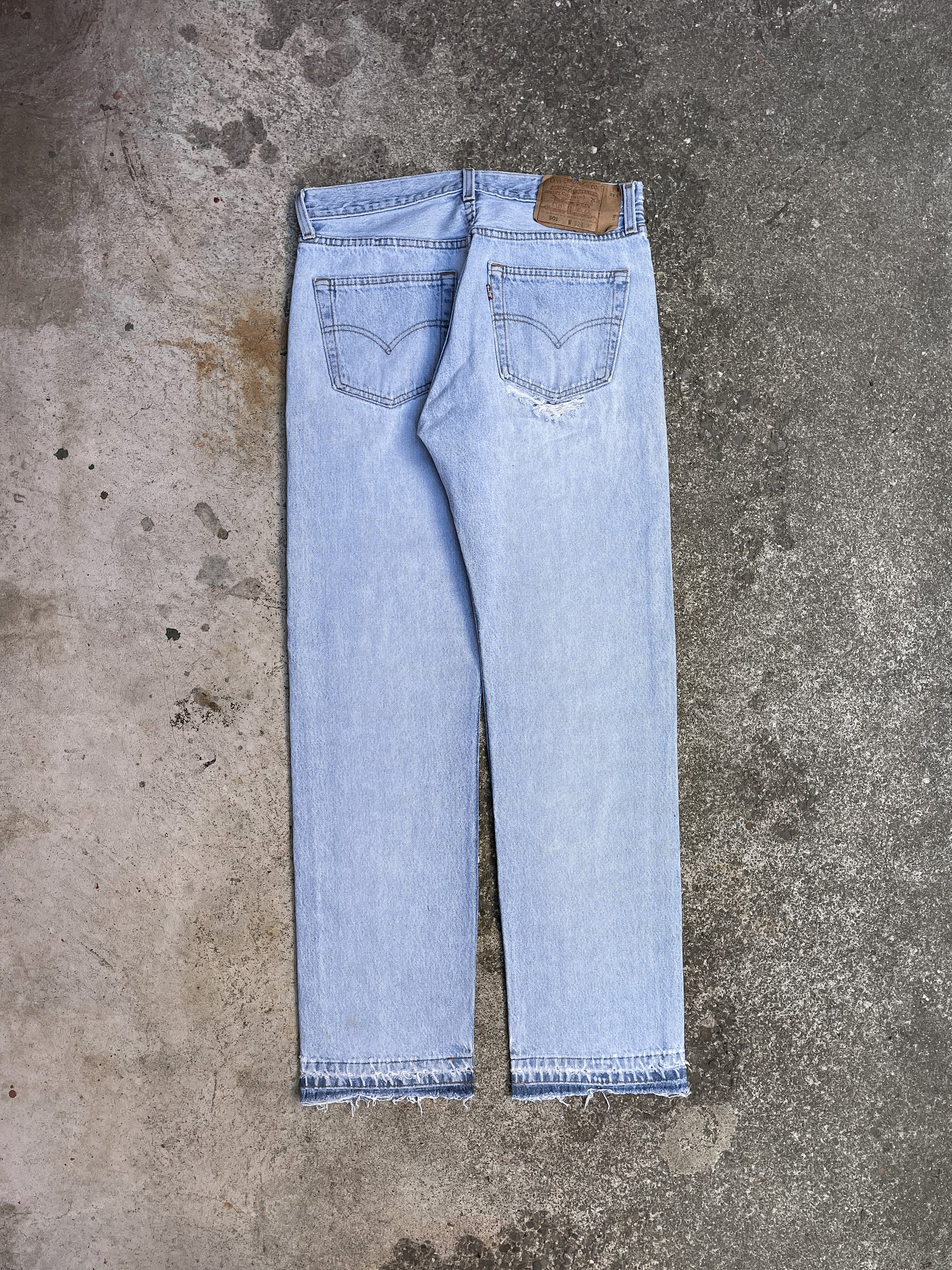 1990s Levi’s Repaired Faded Blue 501 Released Hem (29X31)