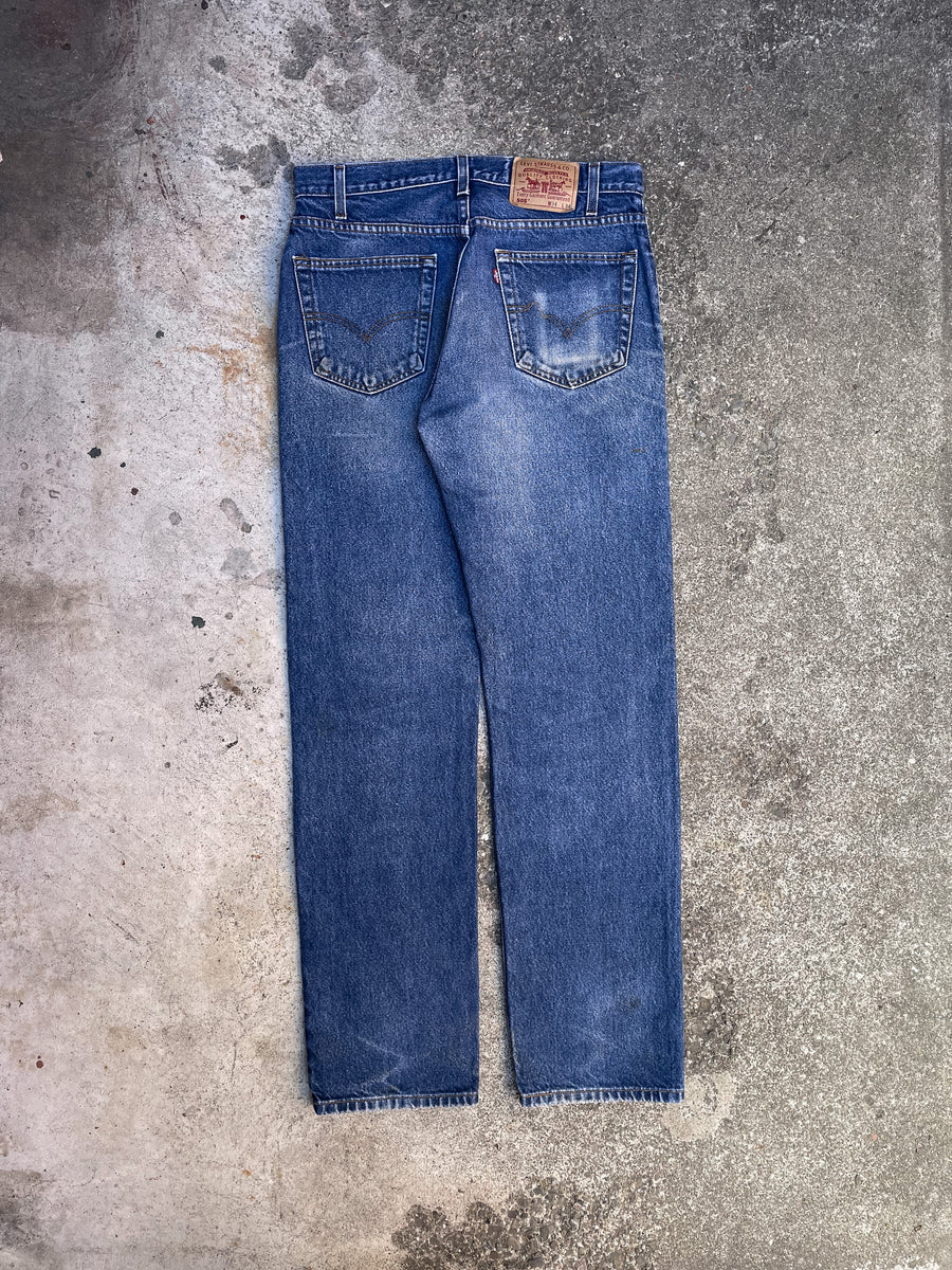 1990s Levi’s Worn In Blue 505 (32X33) – DAMAGED GLITTER