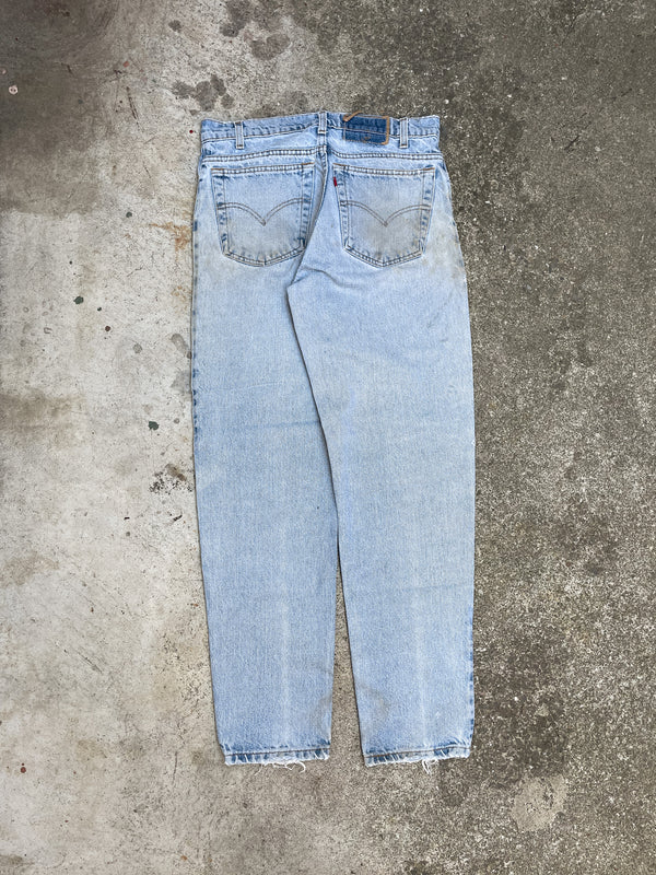 1990s Levi’s Distressed Faded Blue Repaired 550 (31X30)