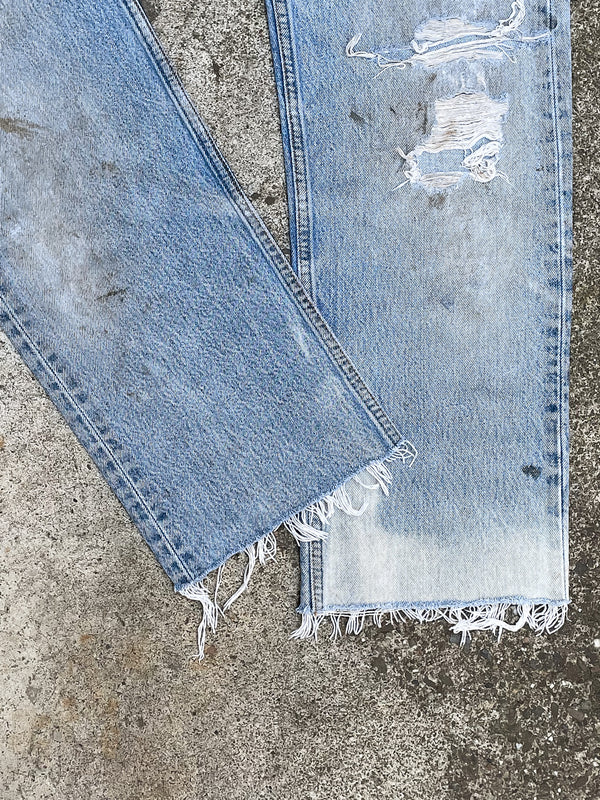 1990s Levi’s Distressed Faded Blue 501XX Raw Hem (30X27)