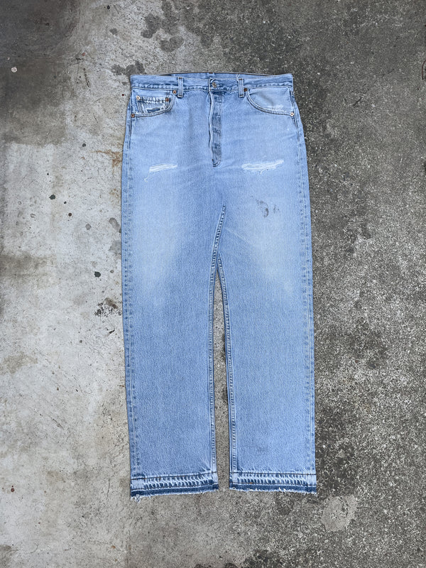 1990s Levi’s Distressed Faded Blue 501 Released Hem (34X31)