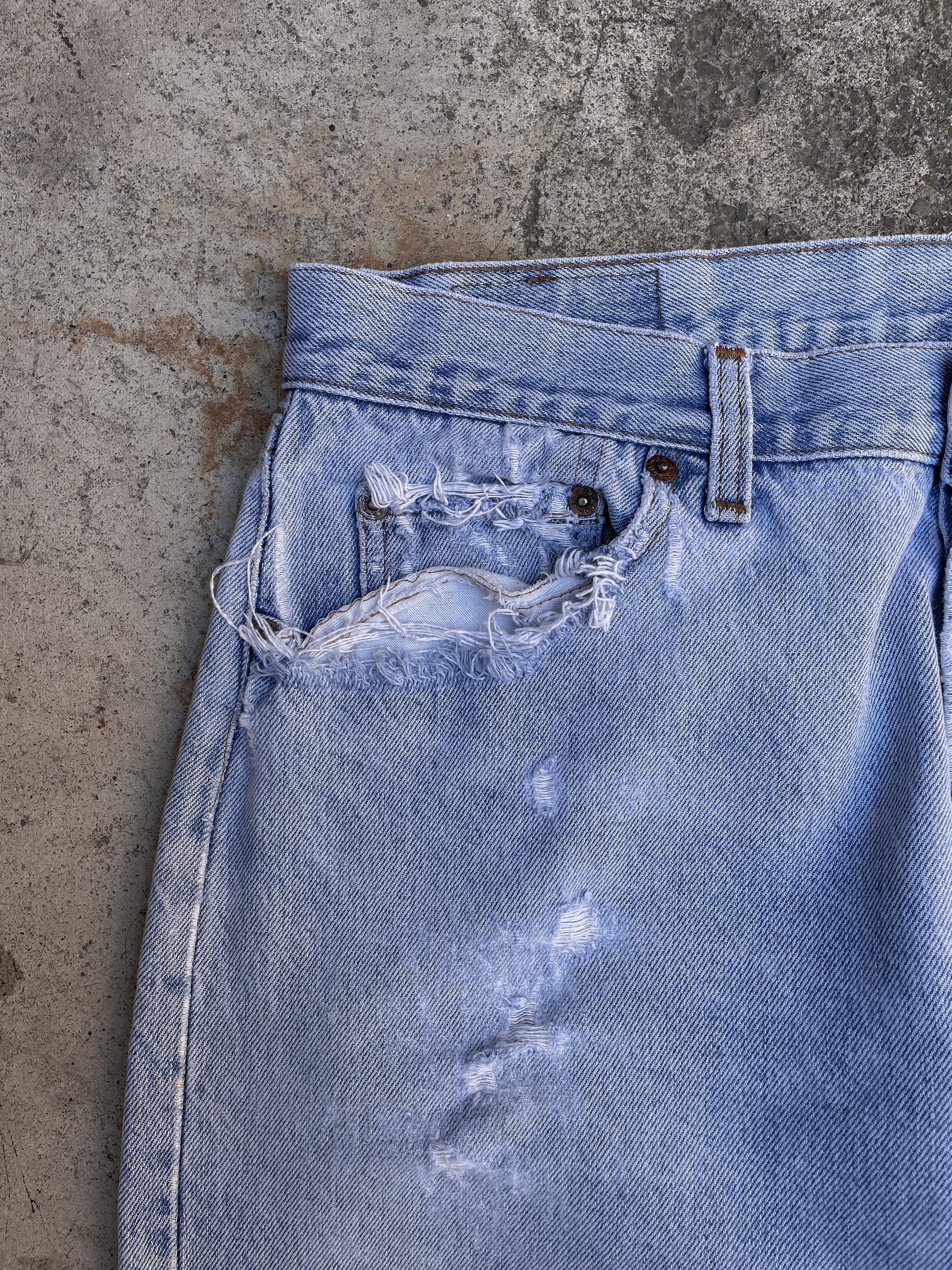 1980s Levi’s Distressed Faded Blue 501 (33X26)