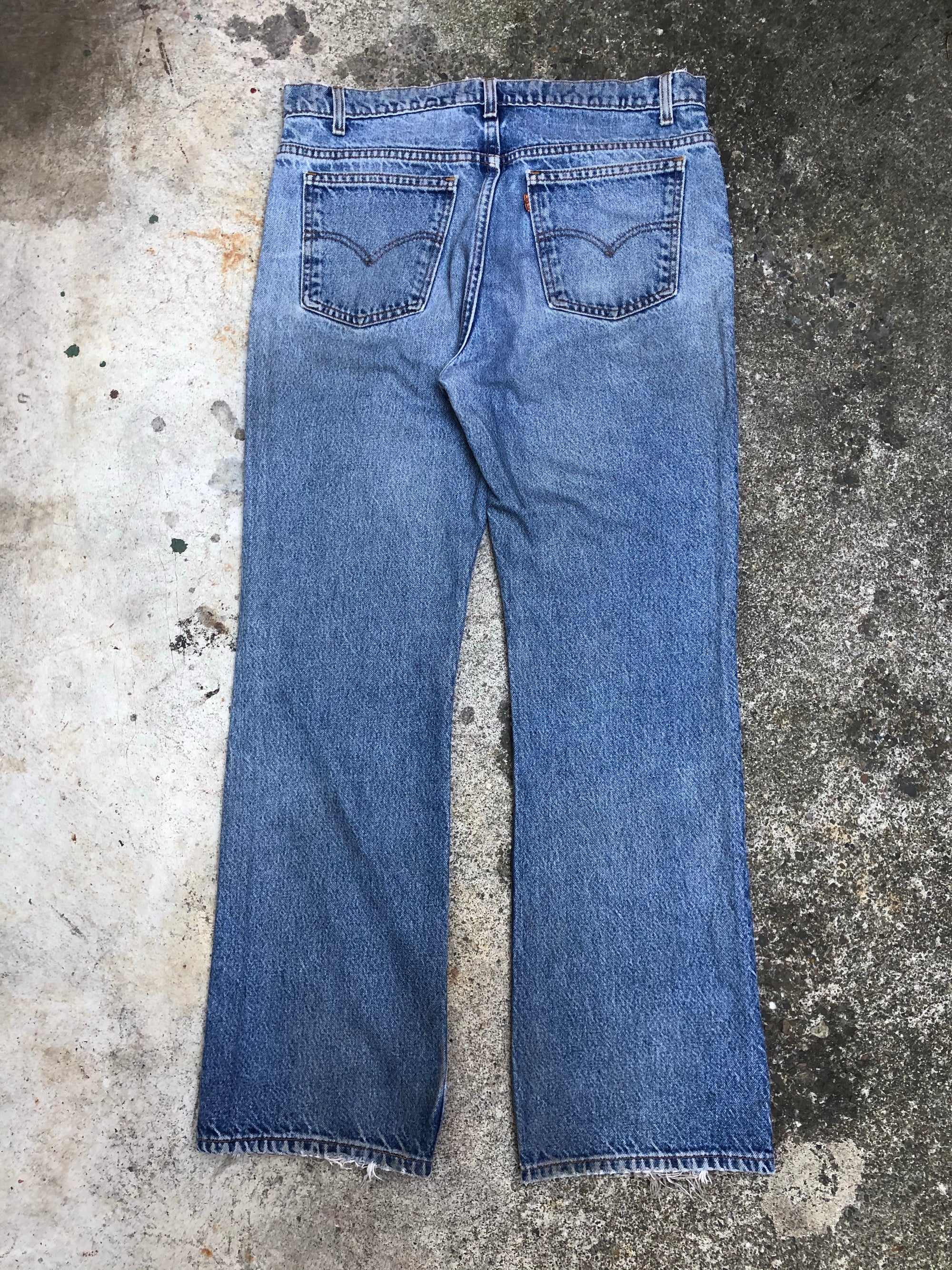 1990s Orange Tab Levis Faded Blue 517 (35X31)