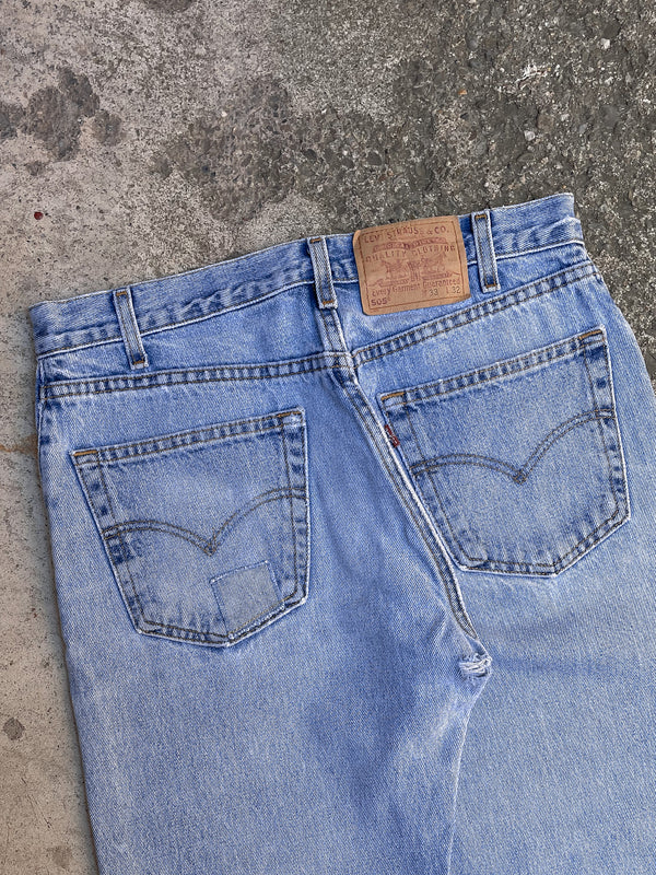 1990s Levi’s Patched Faded Blue 505 Released Hem (32X29)