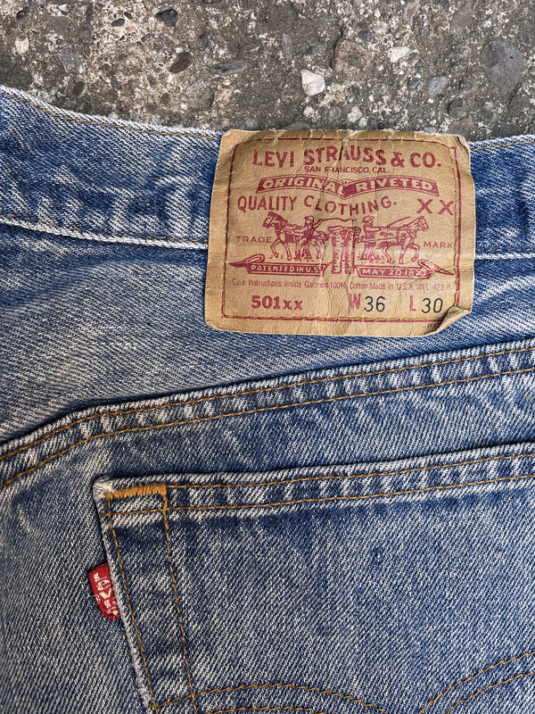 1990s Levi’s Repaired Faded Blue 501xx Released Hem (33X27)