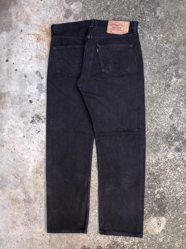 1990s Levis Faded Midnight Oil 501 (33X28)