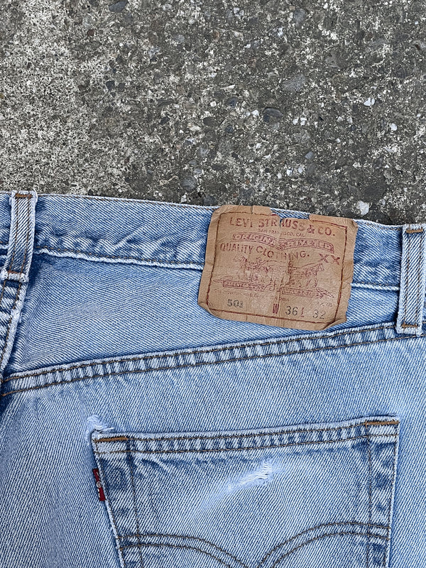 1990s Levi’s Distressed Faded Blue 501 Released Hem (34X31)