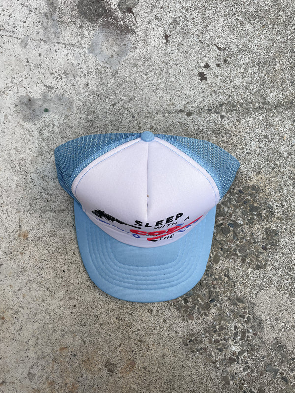 1980s “Sleep With A Cop …” Trucker Hat