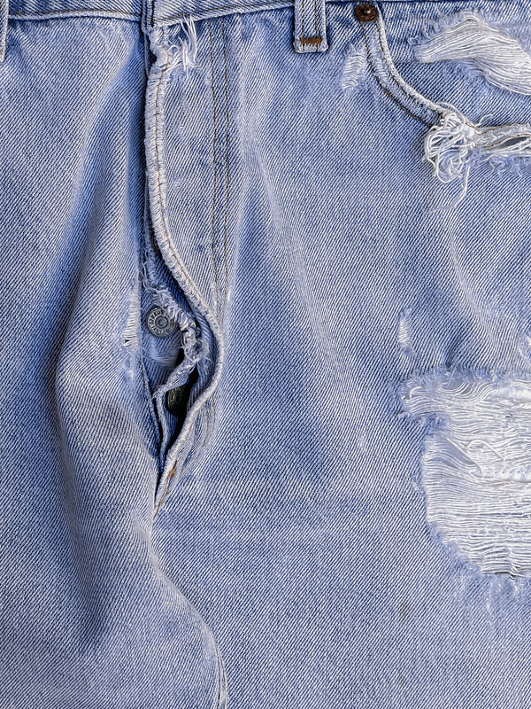 1980s Levi’s Distressed Faded Blue 501 (33X26)