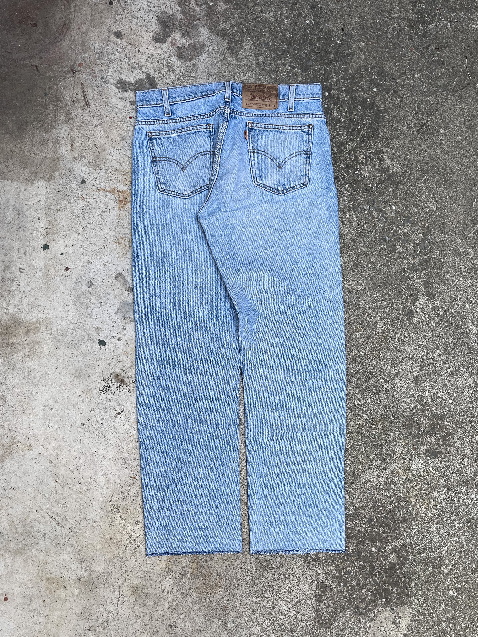 1990s Orange Tab Levi’s Faded Blue 505 Overlock Hem (32X28)