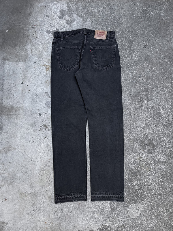 1990s Levi’s Faded Black 505 Released Hem (33X32)