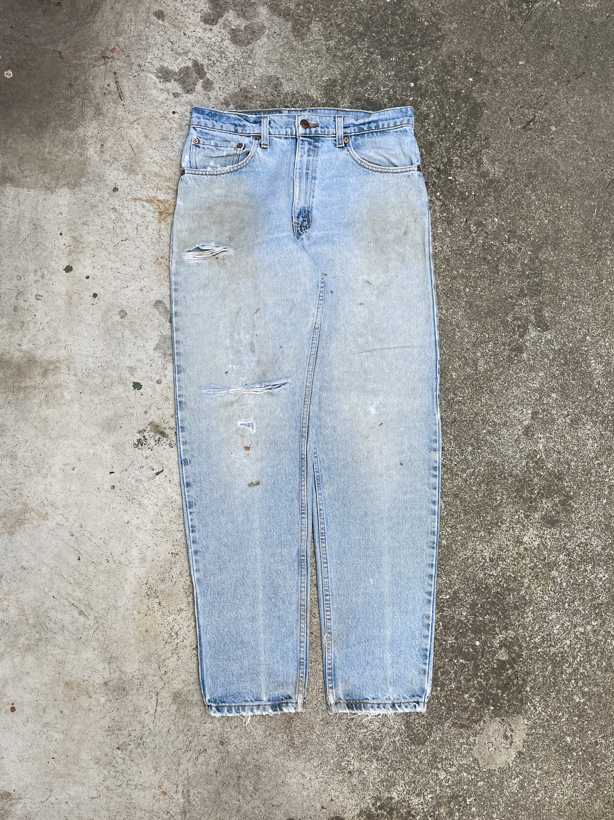 1990s Levi’s Distressed Faded Blue Repaired 550 (31X30)