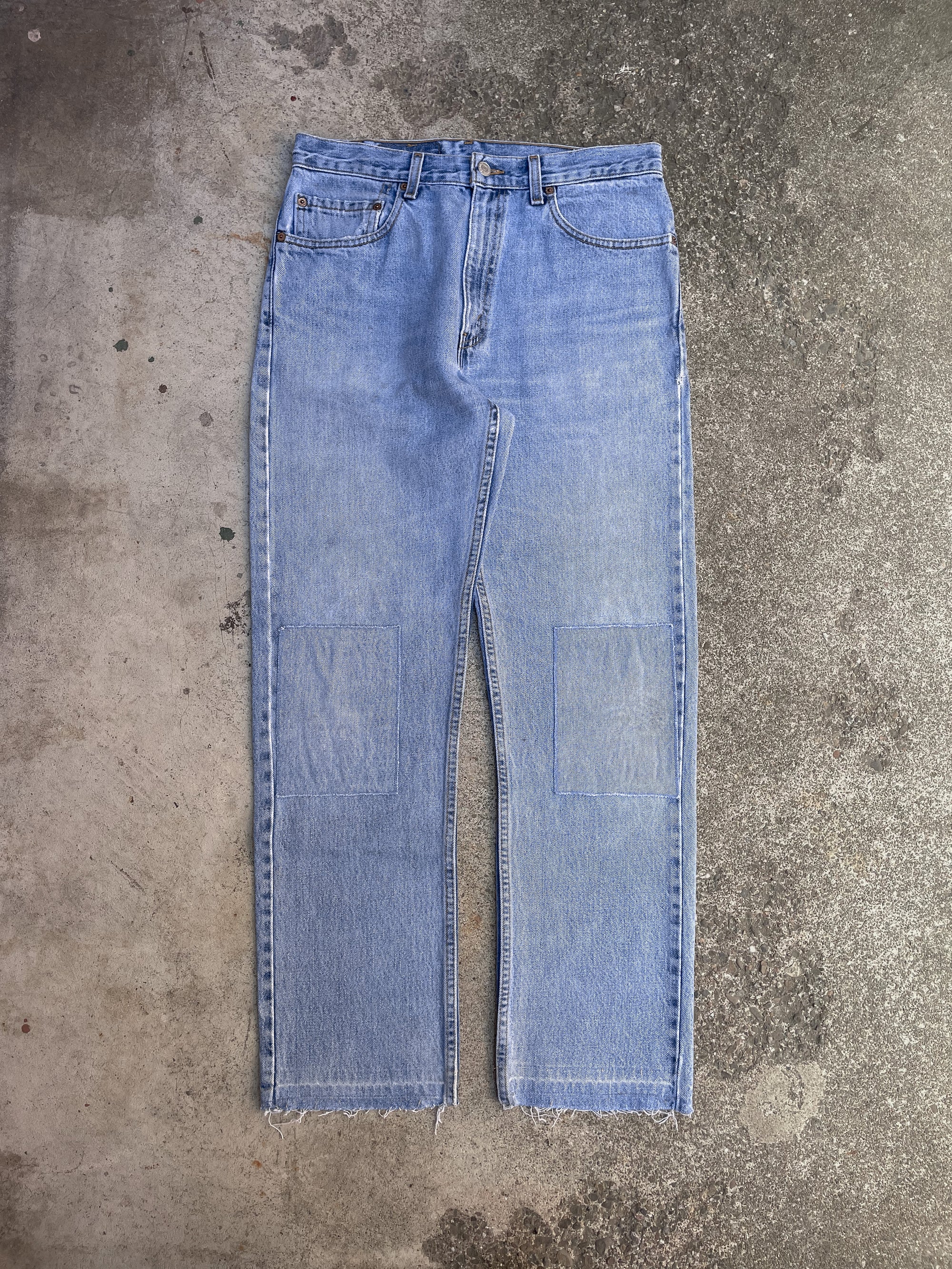 1990s Levi’s Patched Faded Blue 505 Released Hem (32X29)