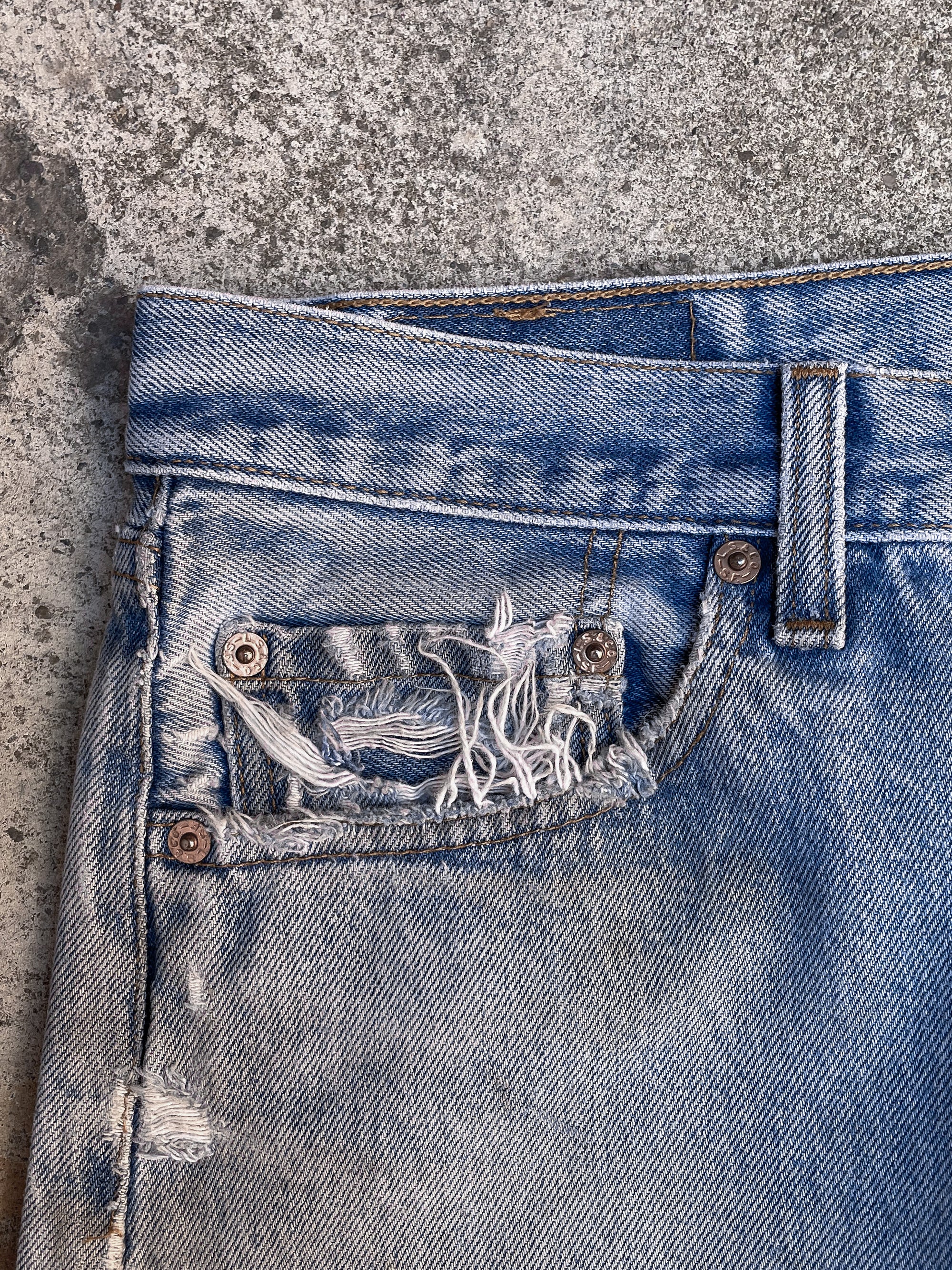 1990s Levi’s Distressed Faded Blue 501XX Released Hem (30X31)