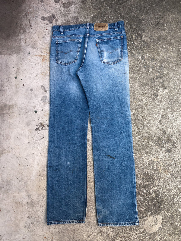 1990s Orange Tab Levis Distressed Dirty Blue 517 (32X32)