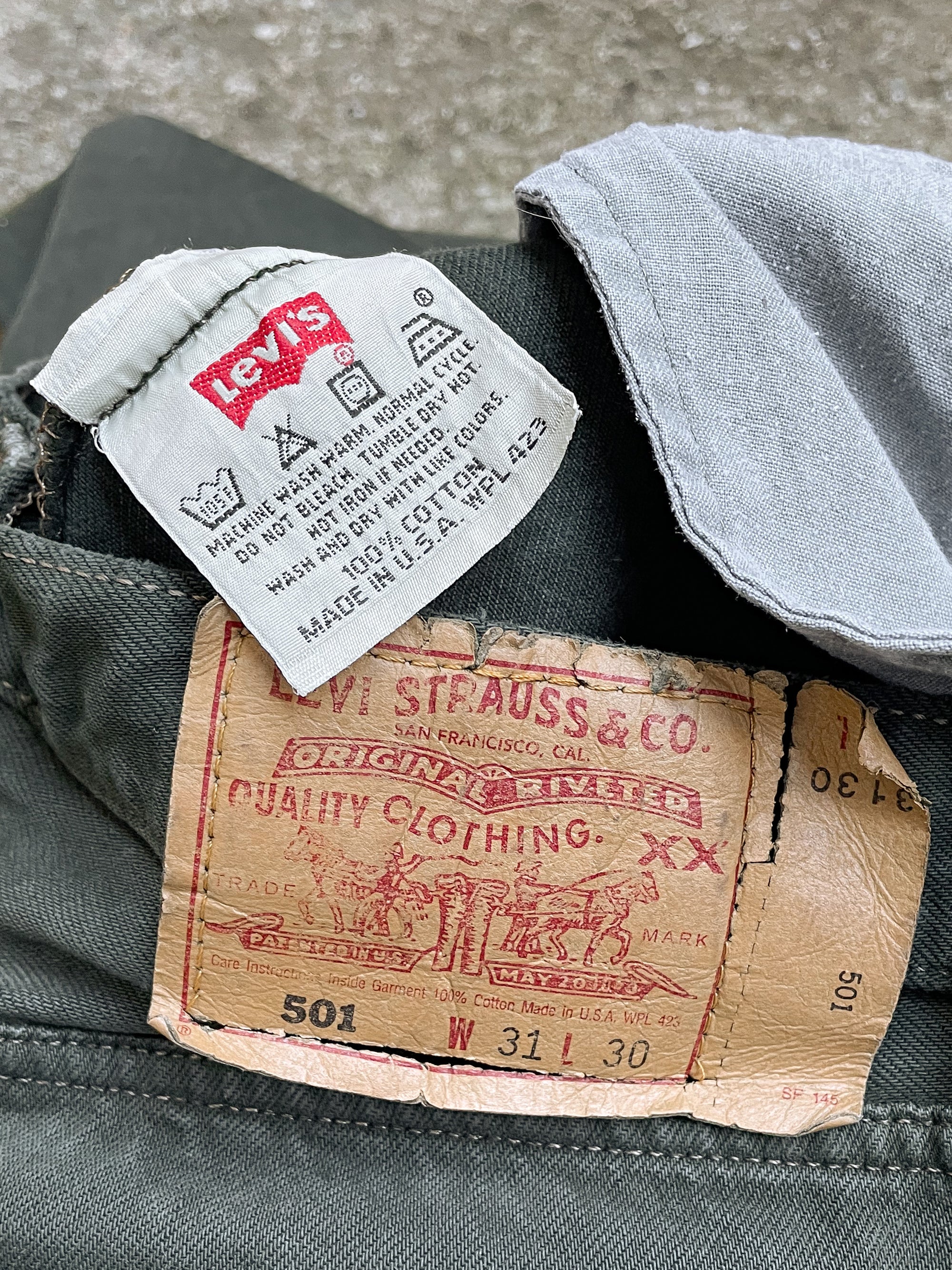 1990s Levi’s Sun Faded Green 501 Released Hem (30X28)