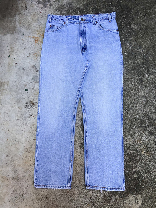 1990s Orange Tab Levis Repaired Faded Blue 518 (33X28)