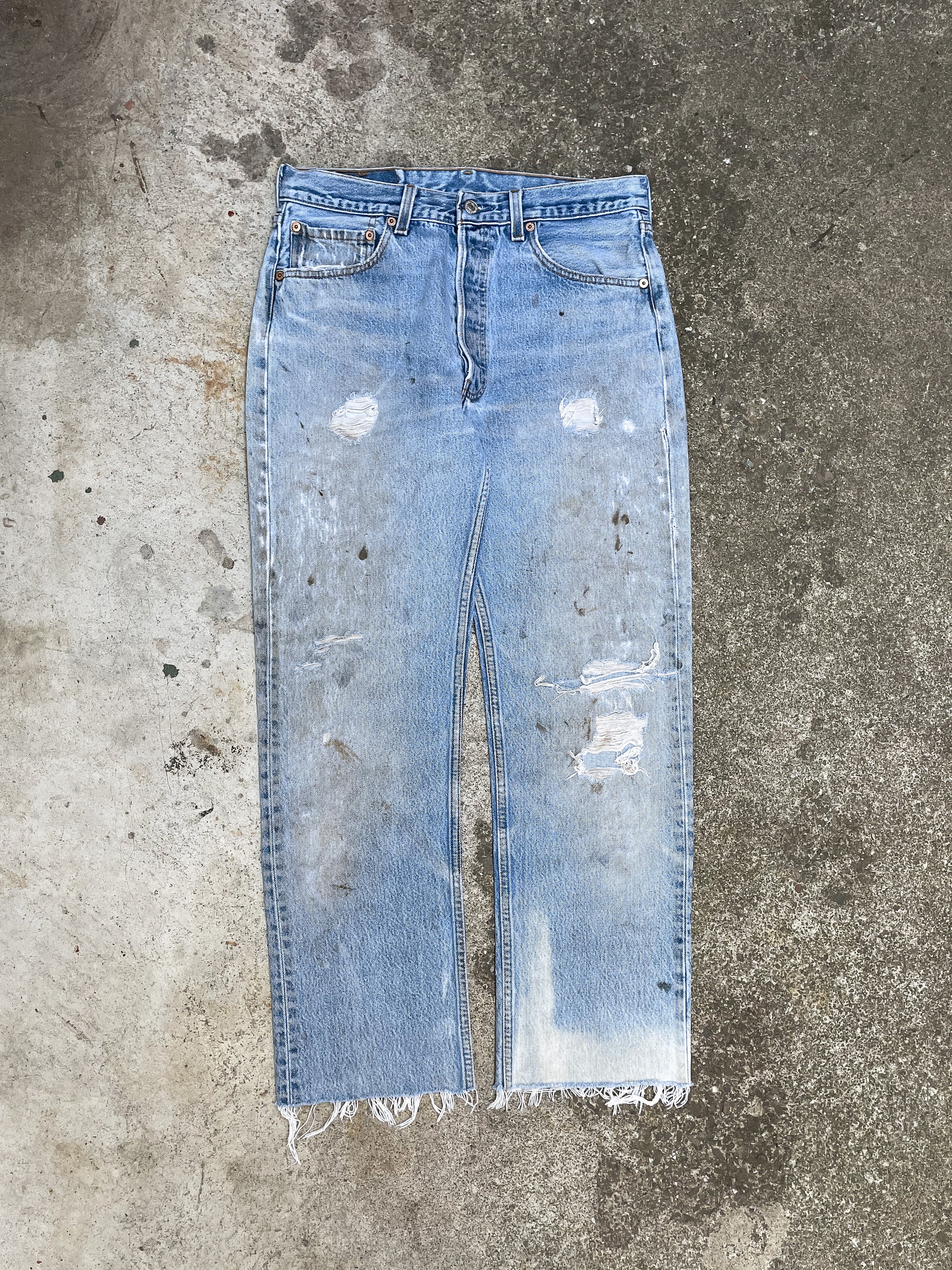 1990s Levi’s Distressed Faded Blue 501XX Raw Hem (30X27)