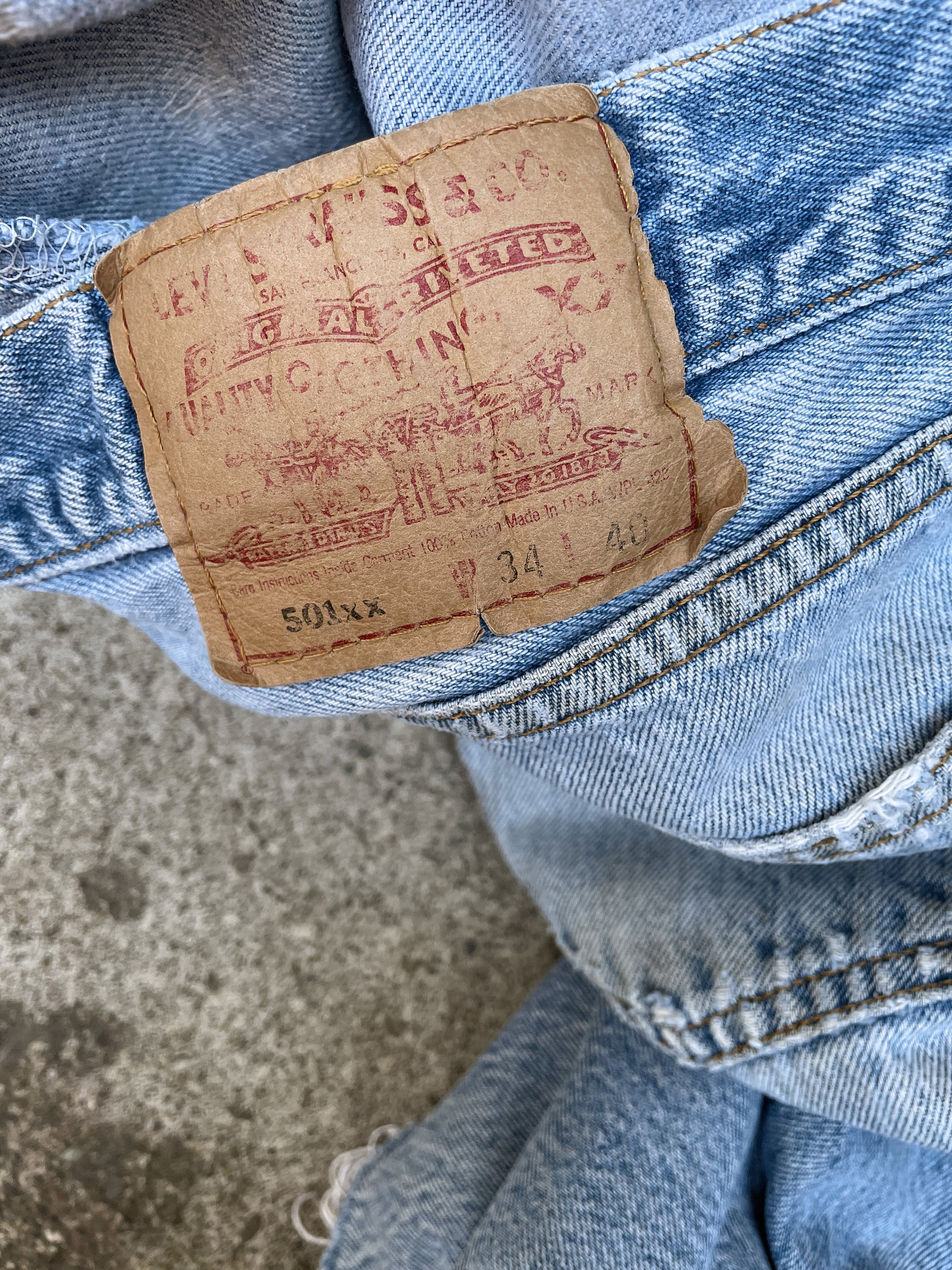 1990s Levi’s Distressed Faded Blue 501XX Raw Hem (30X27)