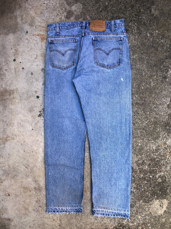 1990s Orange Tab Levis Faded Blue 505 Released Hem (31X28)