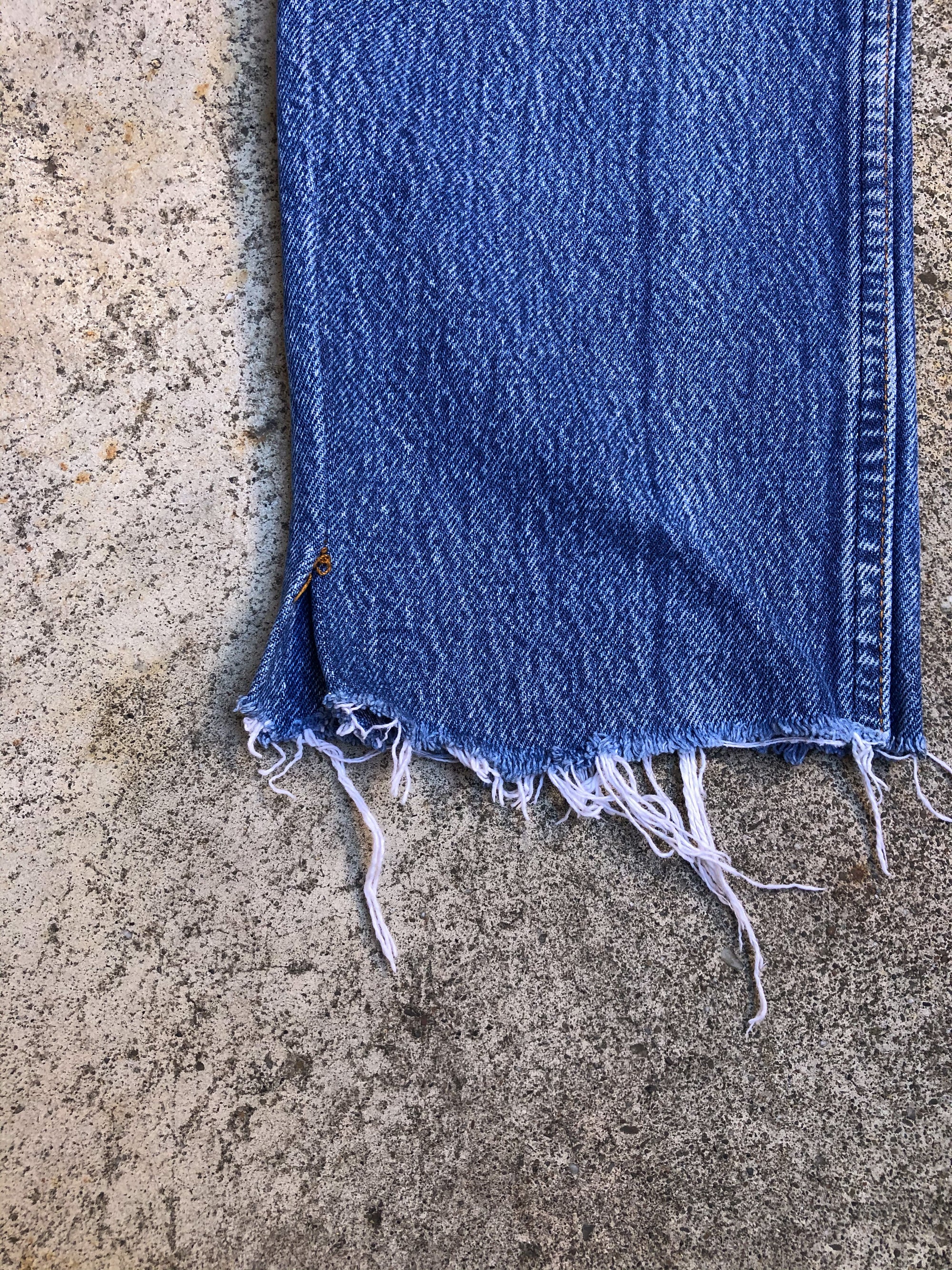 1990s Levis Faded Blue Raw Hem 501 (31X30)