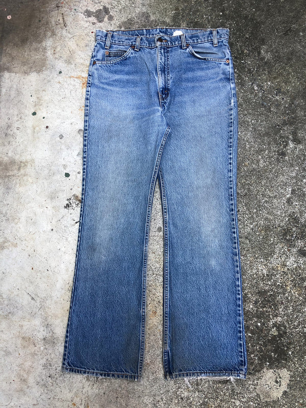 1990s Orange Tab Levis Faded Blue 517 (35X31)